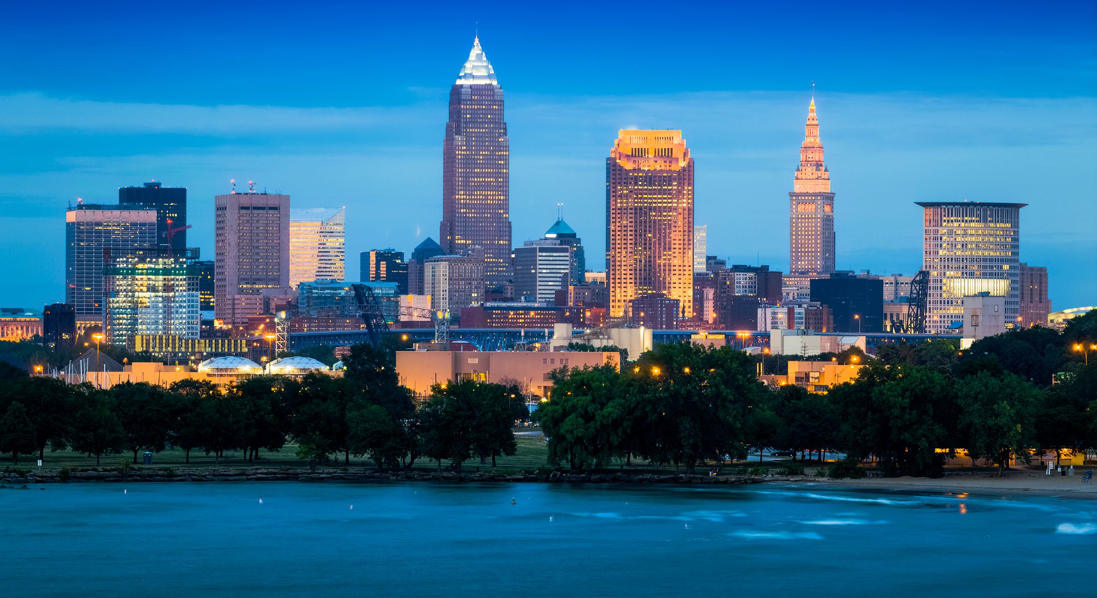 Cleveland skyline at twilight over the lake.